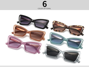 Flat lay of cat-eye sunglasses in six various colors with angular geometric resin frames