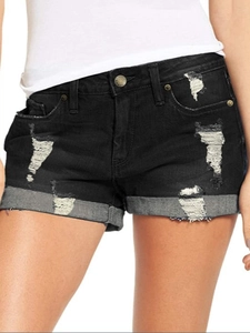Pantalones cortos vaqueros negros elásticos para mujer con rotos y dobladillo vuelto