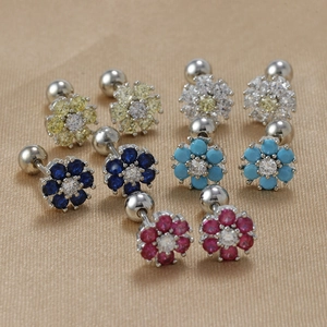 Close-up of five pairs of colorful flower zircon earrings with screw ball backs
