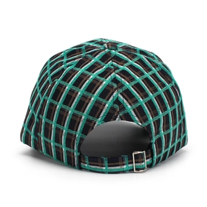 Close-up of vintage plaid baseball cap back with silver metal adjustable buckle strap