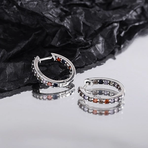 Elegant S925 sterling silver hoop earrings with multicolored zircon stones on black silk