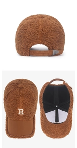 Detail of caramel teddy fleece baseball cap with R embroidery and adjustable strap
