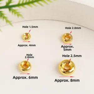 Macro view of 18K gold plated spacer beads in four sizes for jewelry making