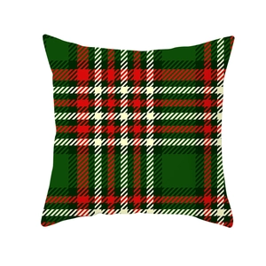 Detail of festive Christmas red and green plaid pillowcase with high-quality stitching