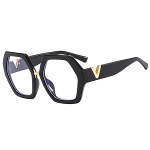 Fashionable black hexagonal full-frame glasses with golden V-shaped metal accents