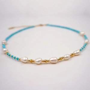 Minimalist handmade turquoise and freshwater pearl necklace with gold-tone accents