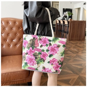 Ethnic style floral tote bag with pink hibiscus print and white thick rope handles