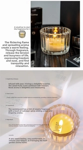 Macro shot of 13g scented candle in glass jar with English Pear and Freesia scent details