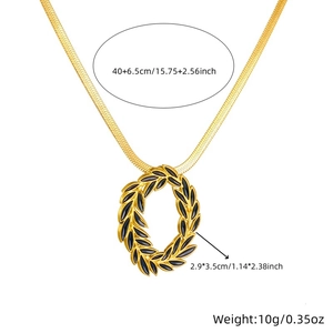 Gold snake chain necklace with black leaf wreath pendant and size specifications