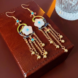 Vintage gold-plated flower earrings with turquoise enamel and long dangling tassels