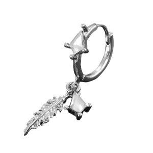 Detail of silver feather hoop earrings with kite-cut zircon gemstones in retro style