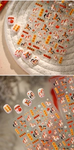 Close-up of m-1360 nail stickers with cartoon horse motifs and lucky Chinese characters