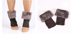 Detailed view of dark grey faux fur trim and ribbed knit texture on winter leg warmers