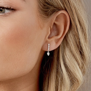 Elegant s925 silver water drop earrings with white zircon on professional female model