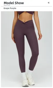 Detail of high waisted yoga leggings in grape purple with V-shaped crossover design