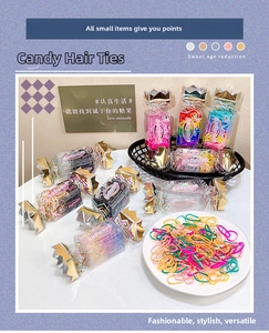 Close-up of colorful high-elastic hair ties in creative candy-shaped packaging