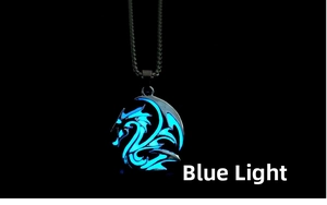 Macro shot of glow-in-the-dark dragon pendant necklace with vibrant blue luminous core