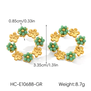 Detailed view of gold flower earrings with green beads, size 3.35cm and weight 8.7g