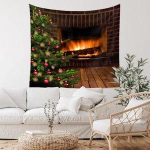 Detail of Christmas tree and fireplace printed tapestry hanging above a white sofa