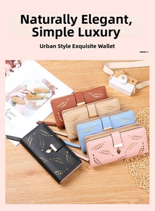 Detail view of stylish long wallets with leaf cutout design and elegant metal pendant