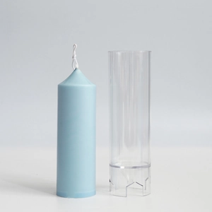 Classic cylindrical candle plastic mold with pointed church top and light blue candle