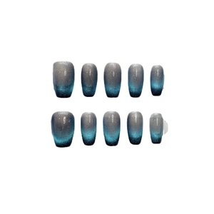 Unghie finte cat-eye blu e grigie con glitter e forma a ballerina media lunghezza