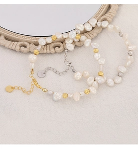 Detailed macro view of S925 sterling silver stamp on baroque pearl bracelets