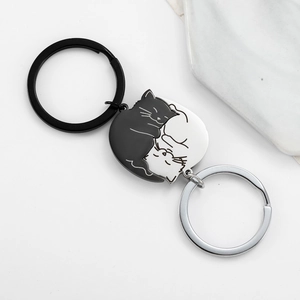 Cute black and white hugging cat stainless steel keychains for couples in a set