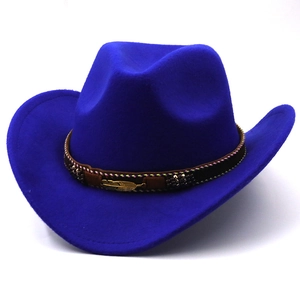 Close-up of royal blue felt cowboy hat featuring ethnic band and gold leaf metal detail