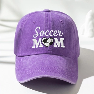 Close-up of Soccer MOM embroidery with heart football on purple washed cotton baseball cap