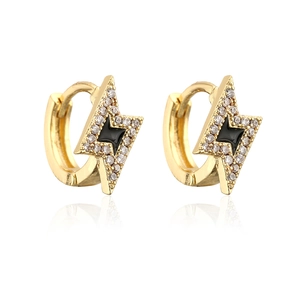 Detailed macro view of 18K gold plated lightning bolt earrings with black enamel and zircons