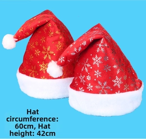 Detail view of red plush Christmas hats with snowflake patterns and 60x42cm dimensions