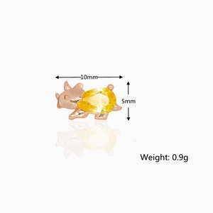 Detailed view of tiny rose gold rhinoceros earring with yellow zircon, size 10mm and 5mm