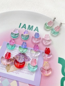 Macro shot of colorful tulip glass beads with gradient finishes for DIY jewelry making