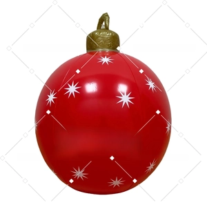 Detail of red inflatable Christmas ball with white snowflakes and LED light feature