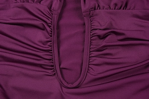 Detailed view of the elegant ruched design and stitching on this deep purple sexy dress