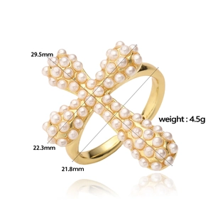 Detail view of gold cross ring with pearls showing 29.5mm size and 4.5g weight specs