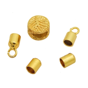 Detail of adjustable gold jewelry beads and end caps for custom bracelet assembly