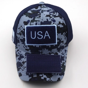 Close-up of tactical digital camo baseball cap with USA velcro patch and mesh back