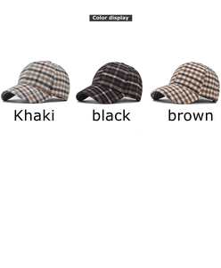 Detailed close-up of thick houndstooth baseball caps in khaki, black and brown colors