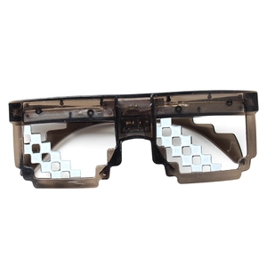 Translucent black pixel-style sunglasses with jagged mosaic edges on white background