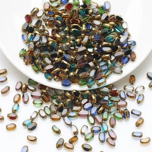 Mix of 4x6mm gold-rimmed oval glass beads for DIY jewelry making in various colors