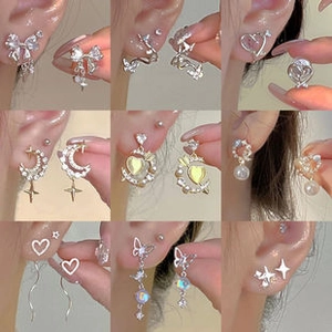 Collection de boucles d'oreilles en peluche avec nœuds, cœurs, lunes et étoiles