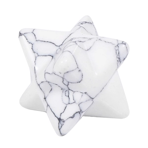 Macro detail of white howlite crystal merkaba star with natural grey marble textures