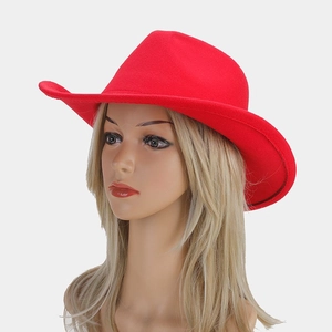 Detailed front view of a vibrant red wool felt cowboy hat with wide brim on a model