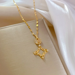 Luxurious gold square diamond necklace with bow pendant on a silk jewelry box