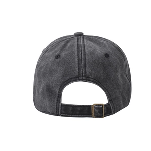 Detail of vintage washed cotton baseball cap with adjustable metal buckle on back