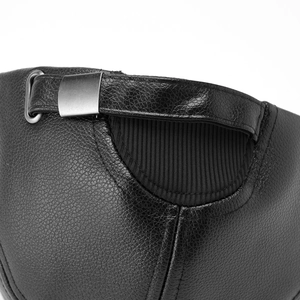 Close-up of black faux leather baseball cap with metal buckle and elastic strap detail