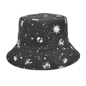 Detail of black cotton bucket hat with white zodiac, moon and sun celestial patterns