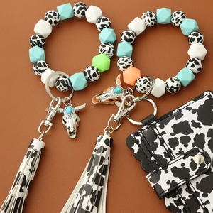 Cow print silicone bead keychain bracelet with leather wallet and metal bull pendant